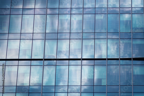 Multi-storey building in the city center. Business center, office. Modern architecture. Details of a modern building.