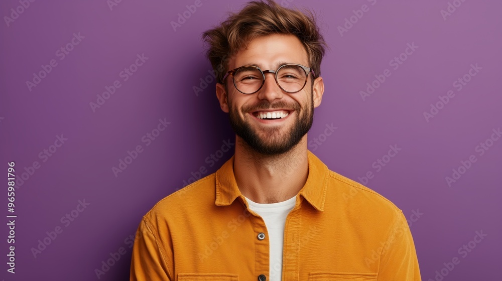 Portrait of a happy handsome man in a shirt with laughing Portrait of a happy handsome man in a shirt with laughing