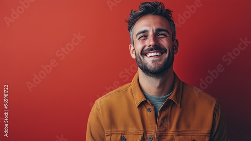 Portrait of a happy handsome man in a shirt with laughing