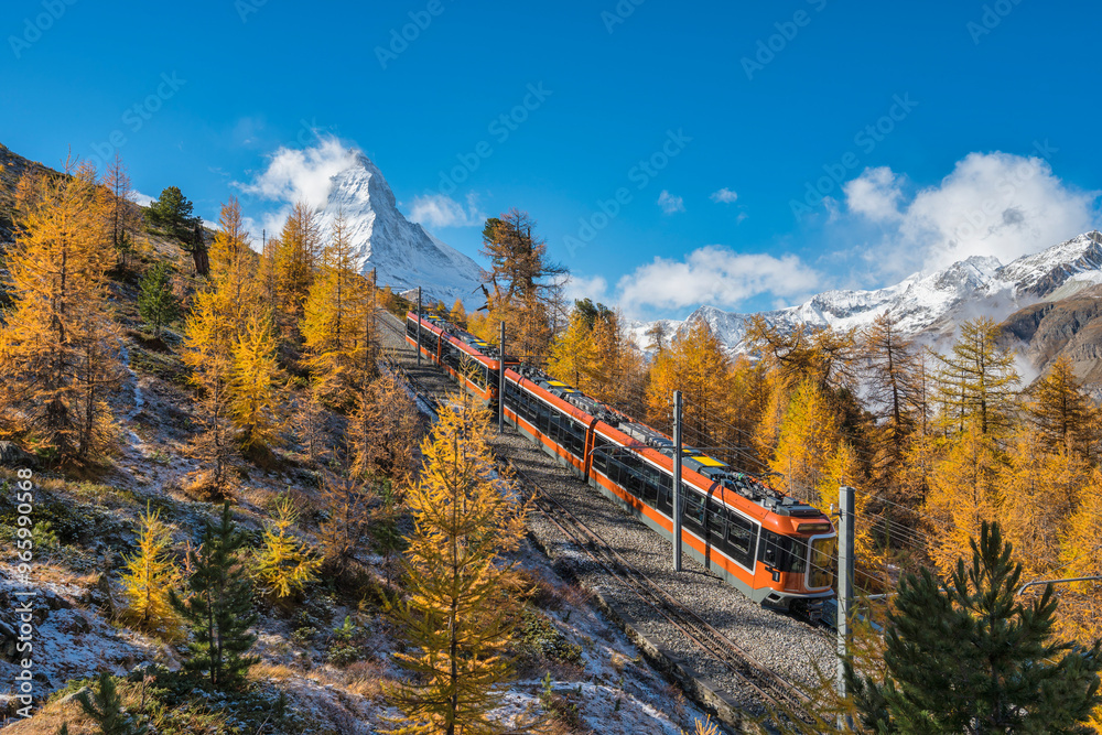 Zermatt Switzerland nature landscape of Matterhorn mountain peak and Gornergrat bahn train in Autumn Season