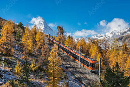Obraz na płótnie Zermatt Switzerland nature landscape of Matterhorn mountain peak and Gornergrat bahn train in Autumn Season w salonie