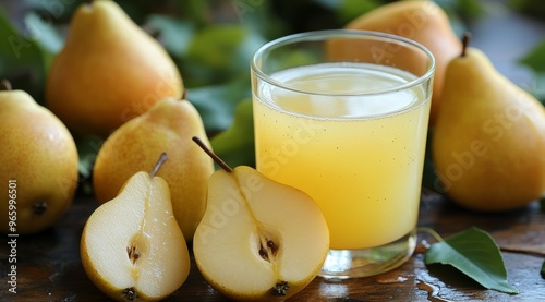 Freshly squeezed pear juice served alongside whole and halved ripe pears with...