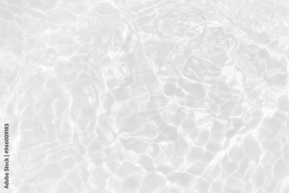 White water with ripples on the surface. Defocus blurred transparent white colored clear calm water surface texture with splashes and bubbles. Water waves with shining pattern texture background. White water with ripples on the surface. Defocus blurred transparent white colored clear calm water surface texture with splashes and bubbles. Water waves with shining pattern texture background.