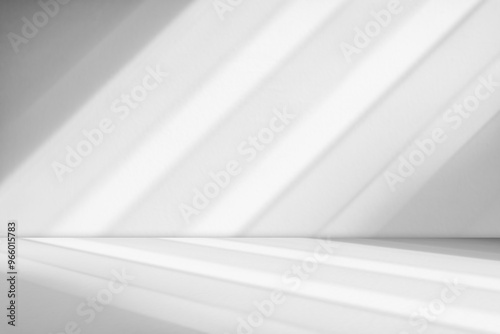 Abstract white studio room with light and shadow from window background for product display presentation