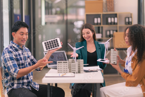 A team of industrial engineers meeting on renewable energy working on innovative solar panel batteries that are efficient in construction projects.