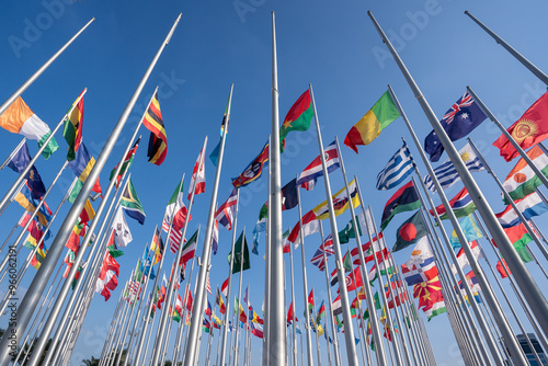 Various flags of the world against the blue sky.