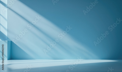 Sunlight streams through a window, casting long shadows on a blue wall and floor