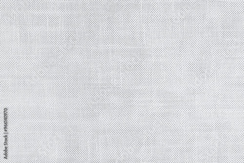 Textured cotton canvas fabric in light gray color, showcasing a woven pattern that adds depth and interest.