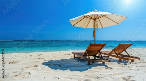 A beach scene with two umbrellas and two beach chairs