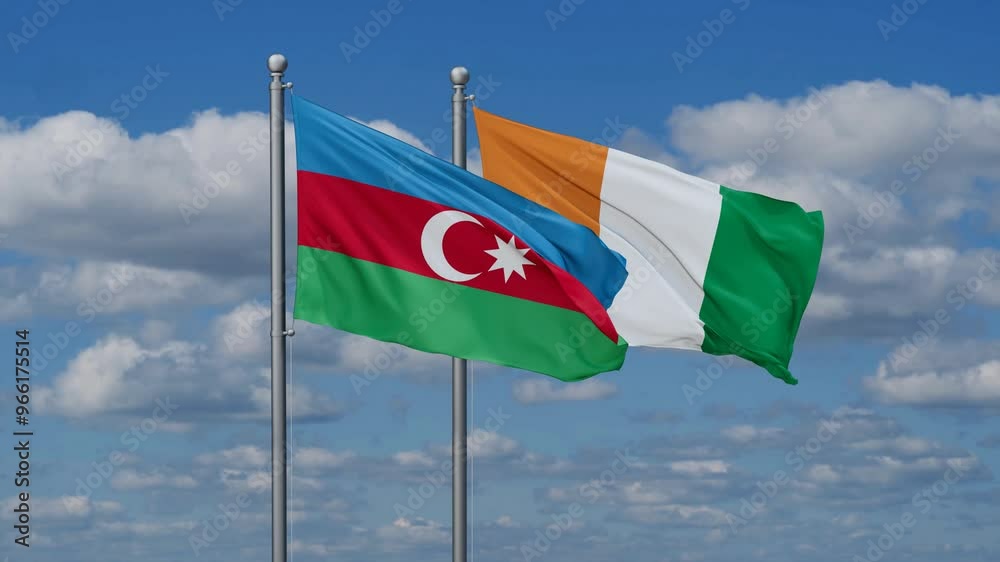 Ivory Coast or Cote d'Ivoire and Azerbaijan flags flying together, video concept of the relationship, two country cooperation concept Ivory Coast or Cote d'Ivoire and Azerbaijan flags flying together, video concept of the relationship, two country cooperation concept