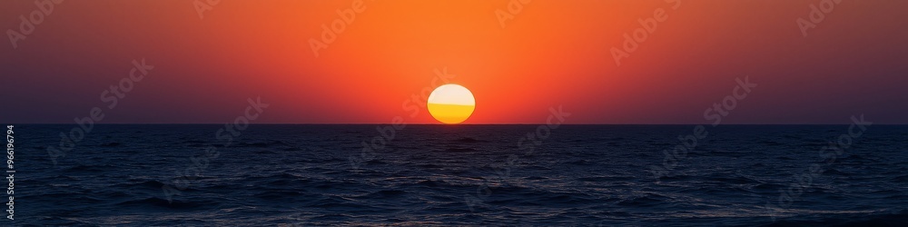 The sun is setting over the ocean, casting a warm glow on the water. The sky is a mix of orange and pink hues, creating a serene and peaceful atmosphere. The water is calm and still The sun is setting over the ocean, casting a warm glow on the water. The sky is a mix of orange and pink hues, creating a serene and peaceful atmosphere. The water is calm and still
