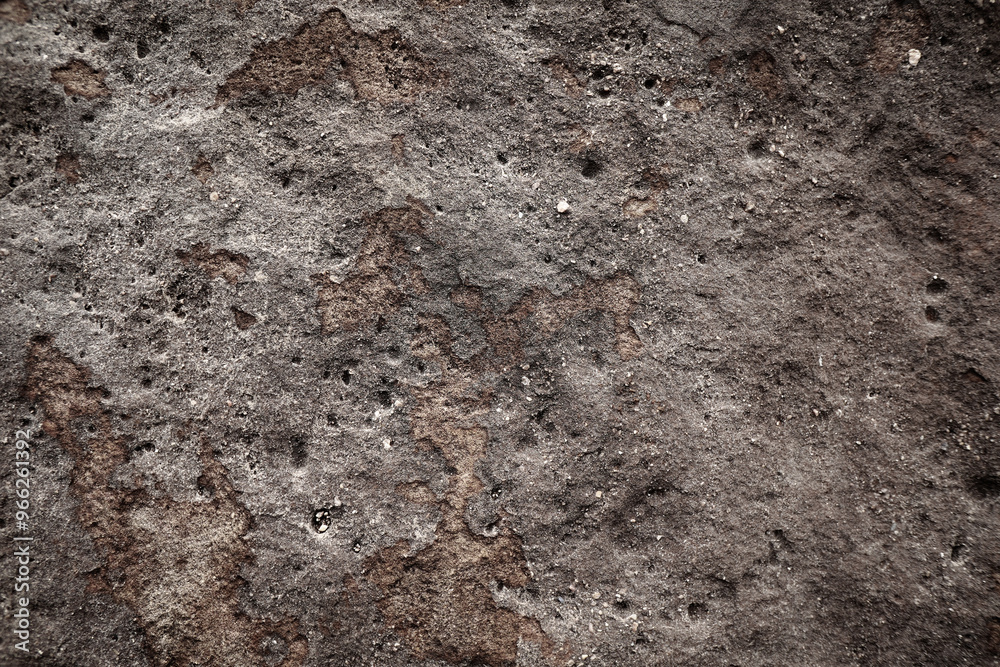 Grey rough sand stone wall with surface pole and potholes for abstract background and texture, interior or exterior design. Beautiful patterns, space for work, banner, wallpaper. Close up. Grey rough sand stone wall with surface pole and potholes for abstract background and texture, interior or exterior design. Beautiful patterns, space for work, banner, wallpaper. Close up.