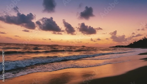 Orange Sunset over the Ocean with Waves Crashing on the Beach