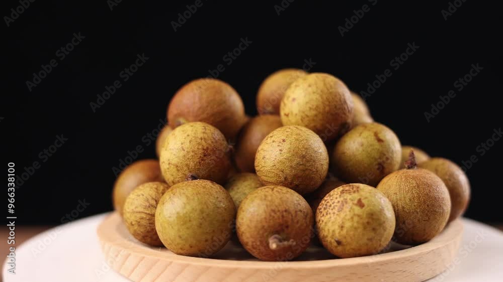 Rotating longan longan summer fruit shot 4k Rotating longan longan summer fruit shot 4k