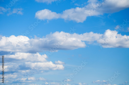 Sky landscape. Blue sky background with white dramatic colorful sunset clouds,