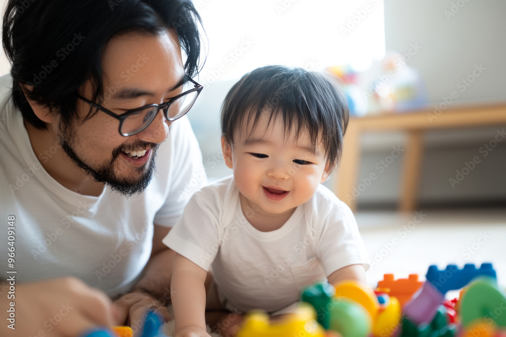 Father and Son Enjoying Playtime with Colorful Toys Father and Son Enjoying Playtime with Colorful Toys