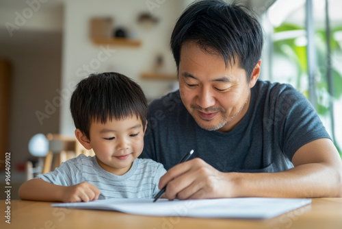 Father and Son Bonding While Learning Together at Home