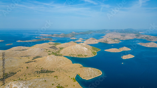 An expansive aerial view of Kornati National Park, showcasing the breathtaking archipelago of islands scattered across the deep blue waters of the Adriatic Sea in Croatia photo