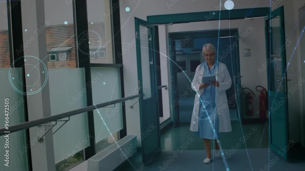 Animation of network of connections over caucasian female doctor using tablet Animation of network of connections over caucasian female doctor using tablet