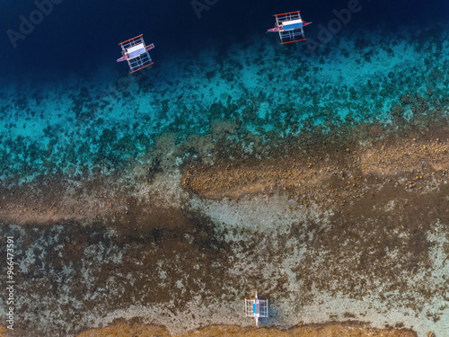 Topdown aerial photograph of bangka boats at the reef in Moalboal, Cebu, Philippines  photo