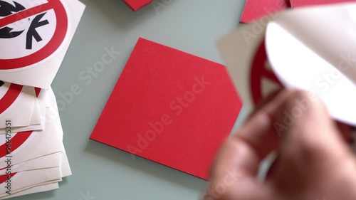 Man's hands pasting 