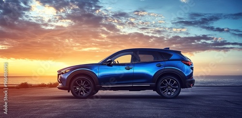 Blue SUV at Sunset