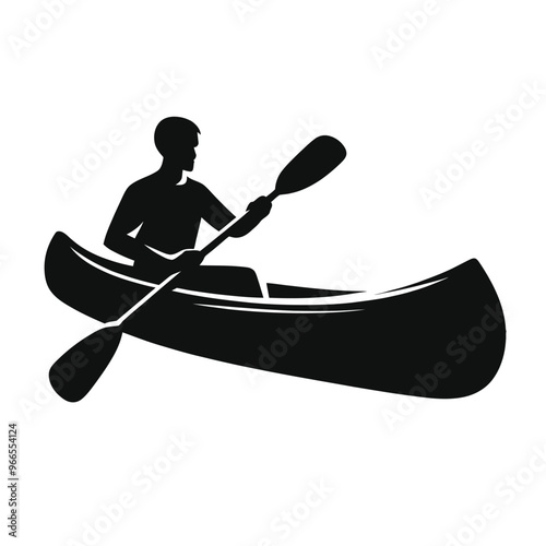 Silhouette of a Person Canoeing on Water