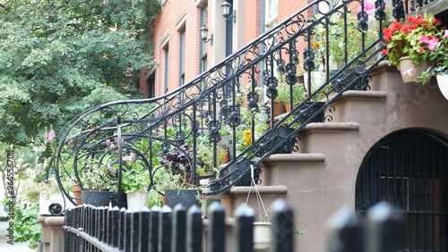 New York City townhouse building, Brooklyn Heights residential district, USA. Brownstone urban architecture, attached house. United States real estate, american property, apartments and homes in NYC. photo