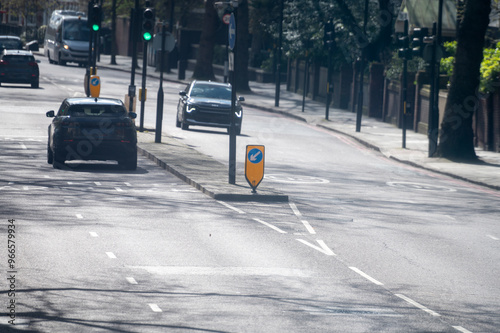 Transportation in London city, roads, road signes, street signes, warnings, indicating of directions in Great Britain, city life in England photo