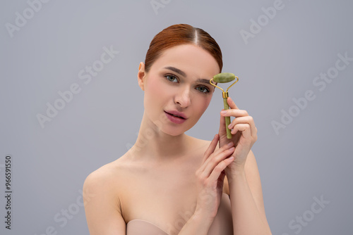 Photography Fresh-faced pretty model undergoing wellness procedure with massager