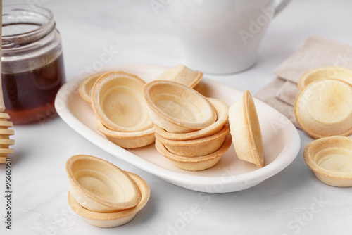 Empty tartlets and honey ja...