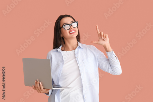 Young female programmer wit...