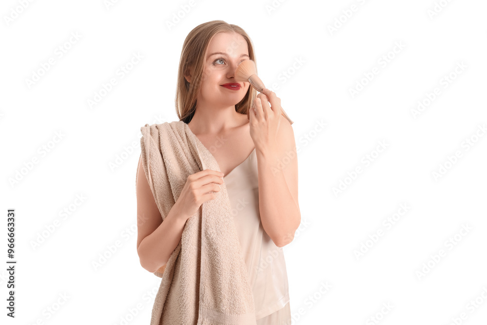 Pretty young woman with makeup brush on white background Pretty young woman with makeup brush on white background