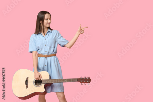 Pretty young woman with aco...