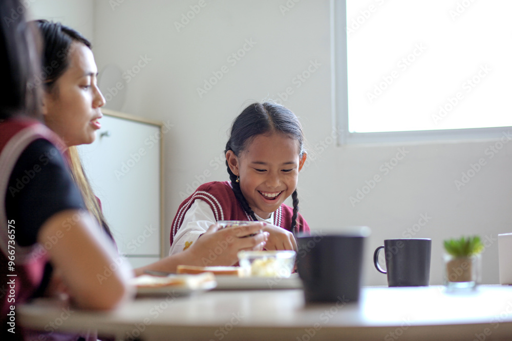 Happy Asian Family Breakfast Together With Bread Before Going To School
Happy Asian Family Breakfast Together With Bread Before Going To School
