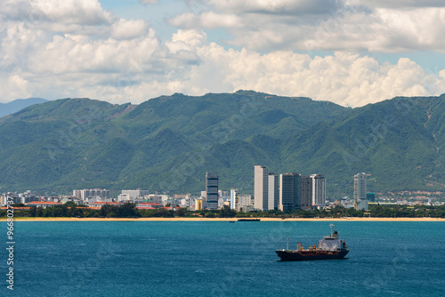 The sea bay and the Vietnamese city of Nha Trang on a sunny cloudy day