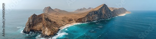 Aerial View of Rugged Rocky Island Surrounded by Turquoise Waters and White Sandy Beaches in a Serene Coastal Setting