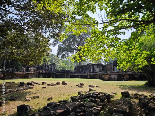 Ancient temple of Angkor empire lies deep in the jungle of Cambodia photo