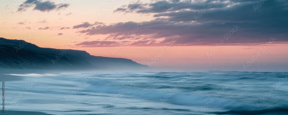 Coastal sunset over ocean waves with rocky cliffs, tranquil scene. Nature beauty and serenity concept Coastal sunset over ocean waves with rocky cliffs, tranquil scene. Nature beauty and serenity concept