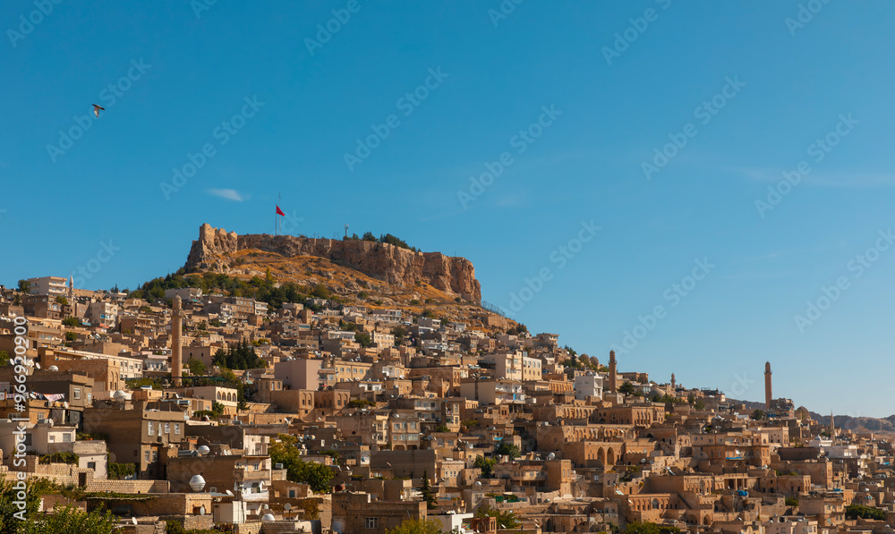 Ancient and stone houses of Old Mardin (Eski Mardin) with Mardin Castle, Located South Eastern of Turkey Ancient and stone houses of Old Mardin (Eski Mardin) with Mardin Castle, Located South Eastern of Turkey