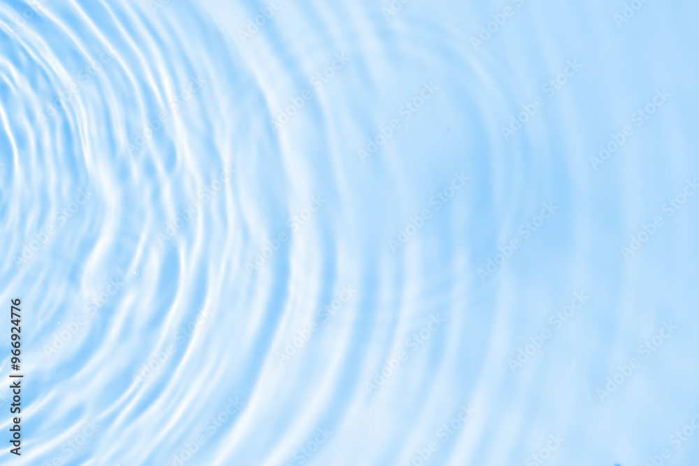 Abstract transparent water shadow surface texture natural ripple on blue background Abstract transparent water shadow surface texture natural ripple on blue background