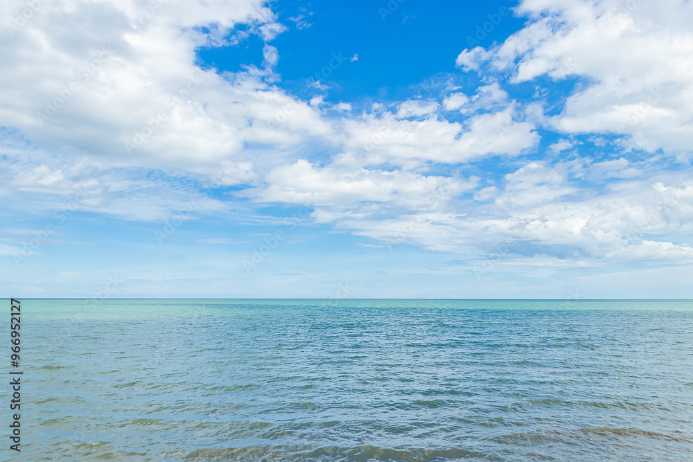 Obraz premium Nature daylight and blue sky with white clouds floating on at morning over the sea.