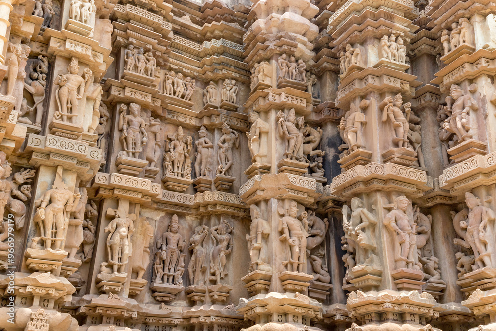 sculptures on the wall of chitragupta temple in khajuraho, madhya pradesh, India.Unesco world heritage site. sculptures on the wall of chitragupta temple in khajuraho, madhya pradesh, India.Unesco world heritage site.