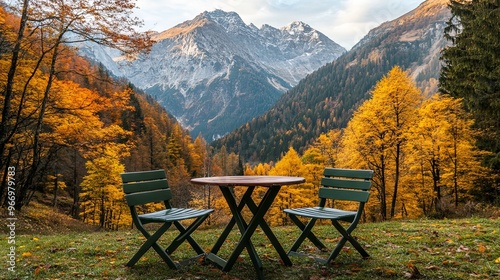 A table and chairs set against the autumn mountain scenery