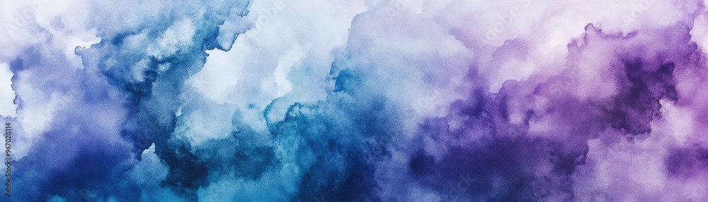 A vibrant watercolor abstract background blending shades of blue, purple, and white for creative design and artistic projects. A vibrant watercolor abstract background blending shades of blue, purple, and white for creative design and artistic projects.
