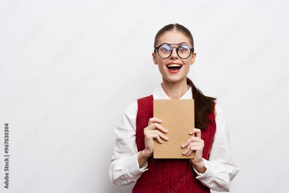 happy young woman with book, smiling, casual attire, light background, educational concept, reading, joy, positive emotions, modern style happy young woman with book, smiling, casual attire, light background, educational concept, reading, joy, positive emotions, modern style