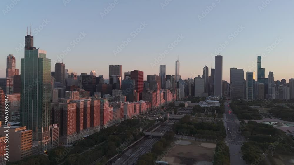 Sunrise view of Chicago's skyline painted in the morning light as the city comes to life. Sunrise view of Chicago's skyline painted in the morning light as the city comes to life.