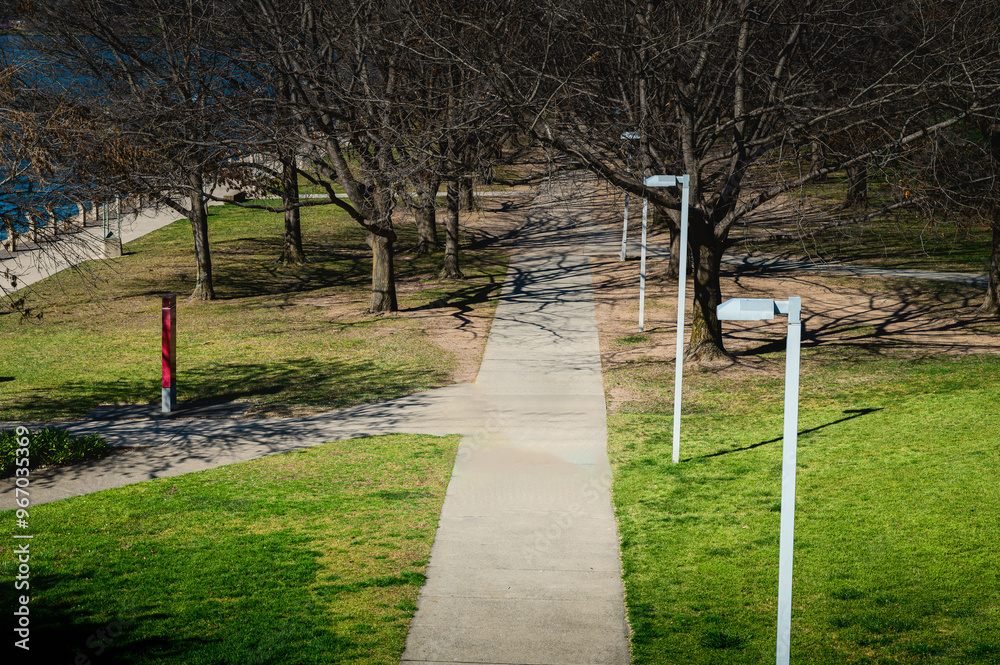 The photo showcases the beautiful scenery on both sides of the Lake Burley Griffin The photo showcases the beautiful scenery on both sides of the Lake Burley Griffin