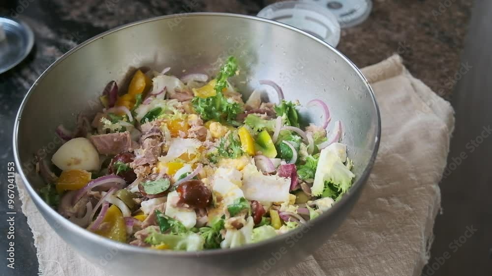 Cooking a summer salad with potatoes and tuna Cooking a summer salad with potatoes and tuna