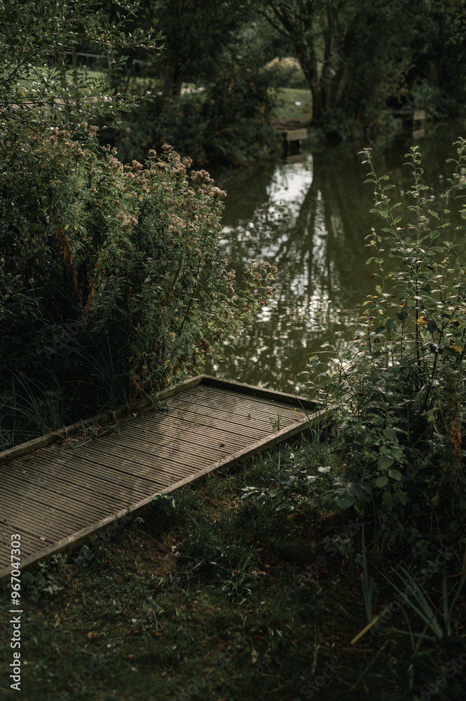 Fototapeta premium wooden bridge on a fishing pond. Corby